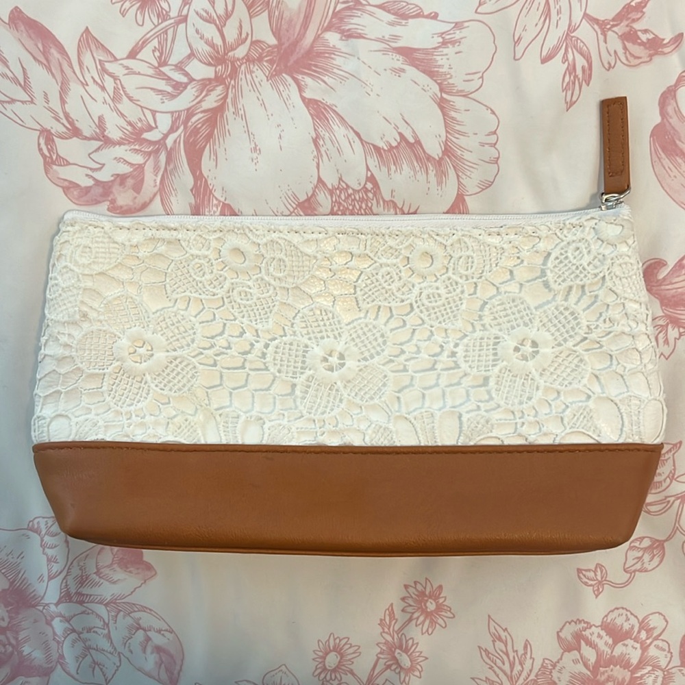White lace cosmetic pouch with brown trim